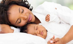 mom-and-child-sleeping-300x179